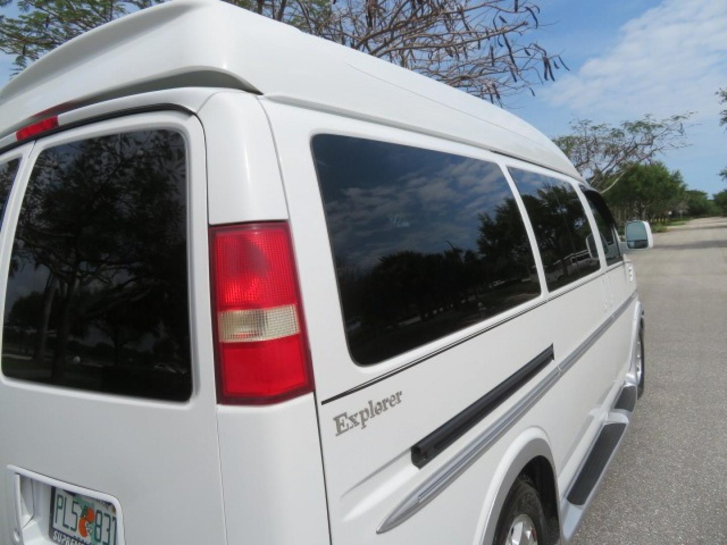 2010 White /Gray Chevrolet Express (1GNUGCD48A1) , located at 4301 Oak Circle #19, Boca Raton, FL, 33431, (954) 561-2499, 26.388861, -80.084038 - You are looking at a Gorgeous 2010 Chevy Express Handicap Wheelchair Conversion Van Explorer Limited SE with 31K Original Miles, Braun Century 750lb Side Entry Wheelchair lift, Tie Down System in the Floor, Rear Entertainment with Flat Screen TV/DVD, Leather Interior, Rear Power Folding Bench Seat/b - Photo#29